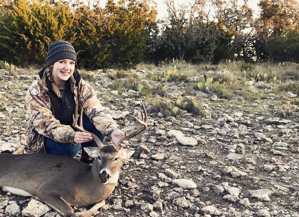 Girl enjoying whitetail Deer Hunt